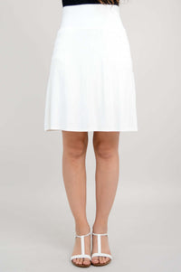 Front view of white Magna Skort on model with sandals