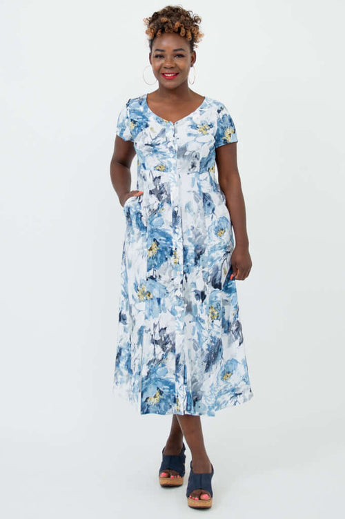 Front view of model wearing blue and white watercolor floral print short sleeve maxi dress