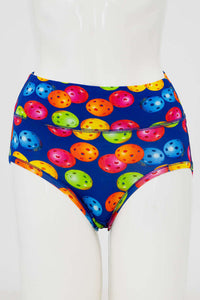 Front view of classic brief with colorful pickleball pattern on blue background