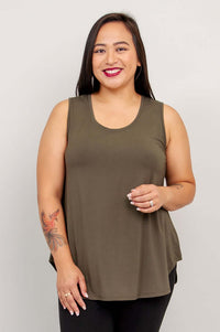 Model wearing an olive green sleeveless bamboo tank top, front view