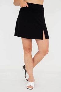 Front view of black Melly skort with high waistband and side slit