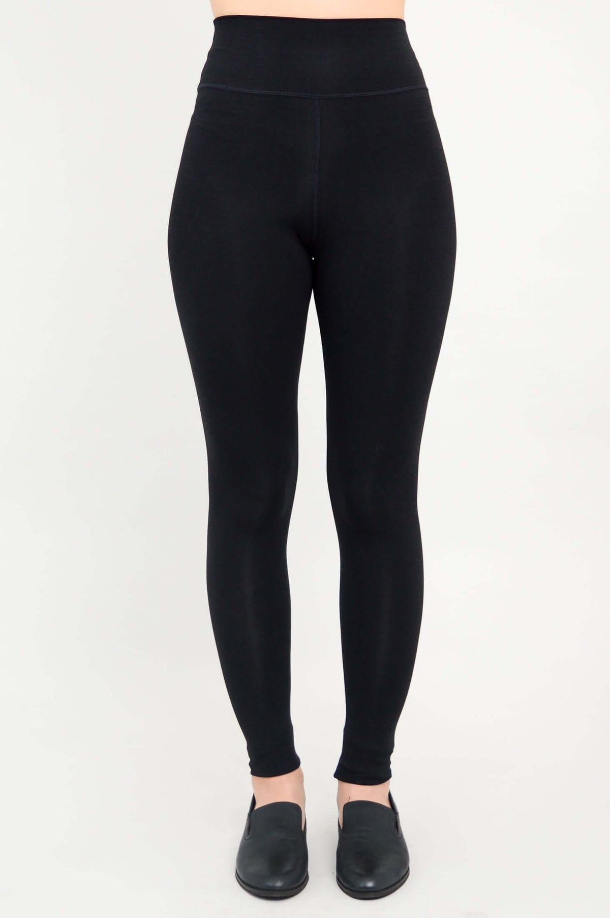 Front view of black fleece-lined leggings with high waistband
