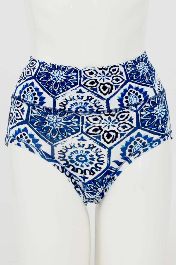 Front view of blue mosaic patterned high-waist brief on mannequin