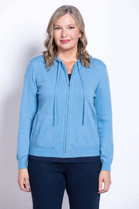 Front view of woman wearing blue wool-cashmere zip hoodie
