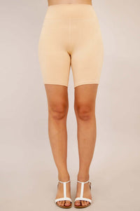 Front view of nude bamboo shorts worn by model