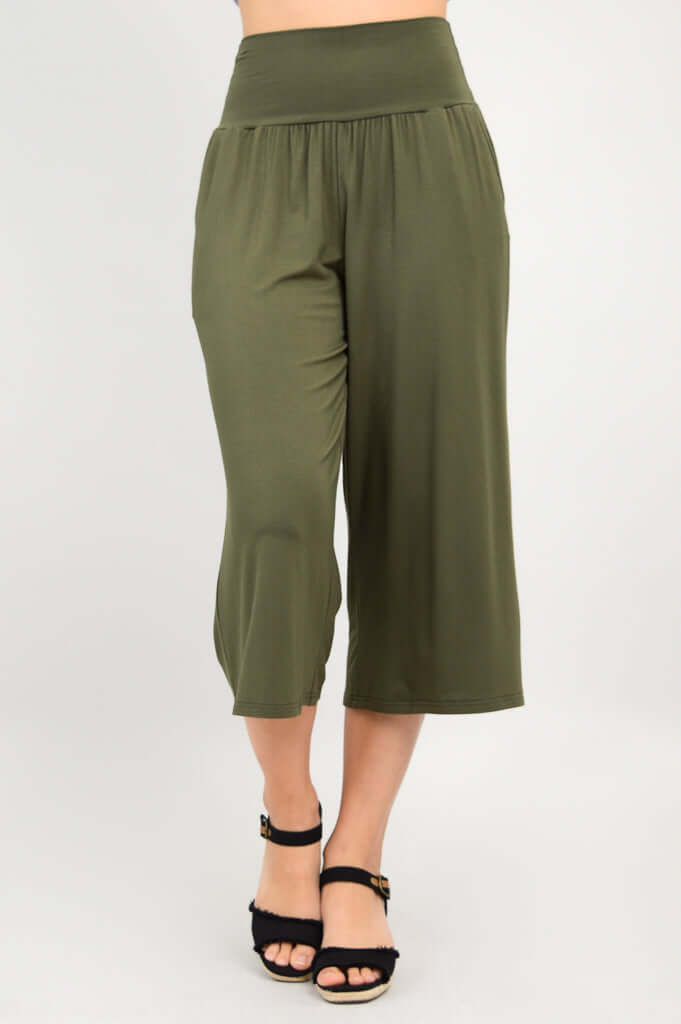 Front view of olive green cropped palazzo capri pants with wide waistband