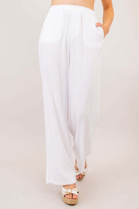 Front view of white wide leg linen-bamboo pants with pockets