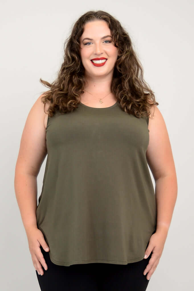 Plus-size model in olive green sleeveless bamboo tank top, front view