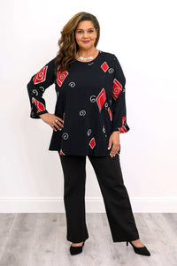 Full-length view of the Palace Blouse styled with black pants and heels