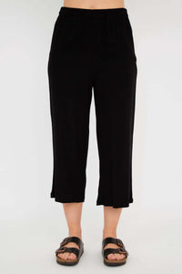 Full front view of black capri pants on model