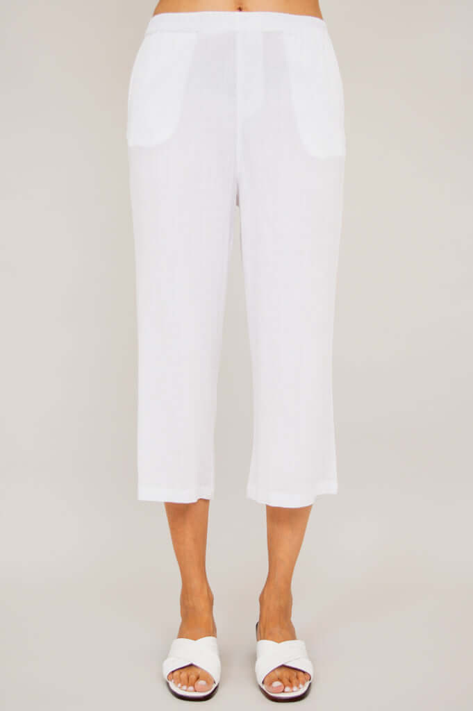 Full front close-up of Bella Capri Pant in white, highlighting waistband and pockets