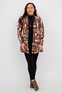Woman wearing Pauline patterned jacket shown in full, hands at sides