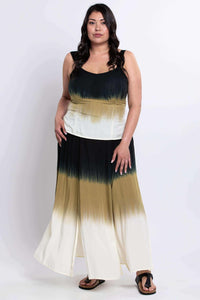 Model displaying the full, flowing dip-dye maxi skirt in a relaxed pose