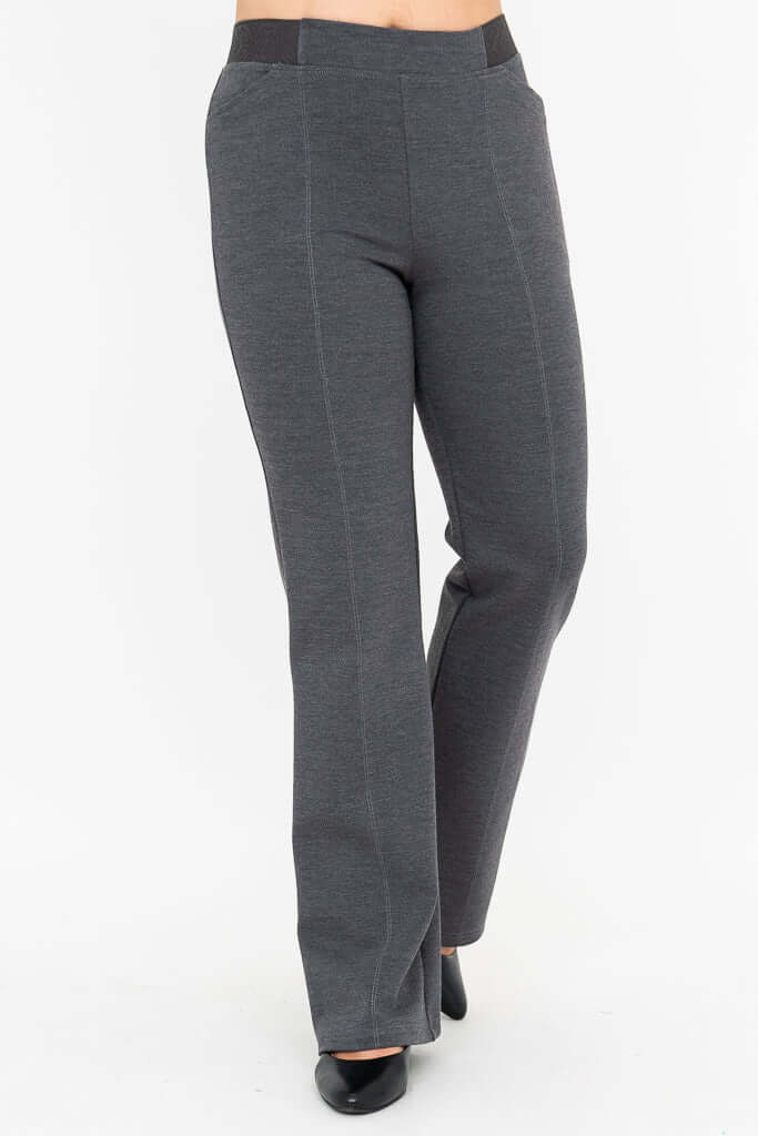 Close-up of granite grey flare pants with flat waistband and front seams