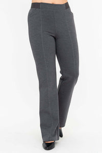 Close-up of granite grey flare pants with flat waistband and front seams