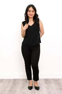 Woman wearing a black Havana Tank in linen bamboo fabric.