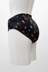 Side view of mannequin wearing a pair of full coverage black soccer print underwear