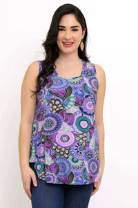 Close-up front view of woman wearing purple mandala print top and denim pants