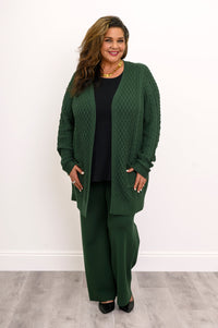 Comfortable forest green cable knit long sleeve cardigan top for a cozy winter outfit look.