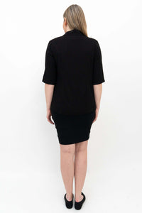 Back view of model wearing Jonelle black pencil skirt showing fit