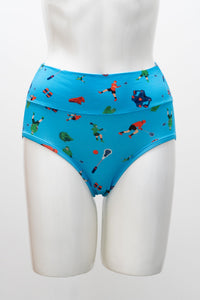 Blue underwear with a colorful lacross pattern on a mannequin against a white background, front view