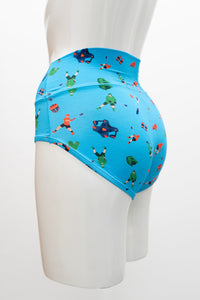 Blue underwear with a colorful lacross pattern on a mannequin against a white background, side view