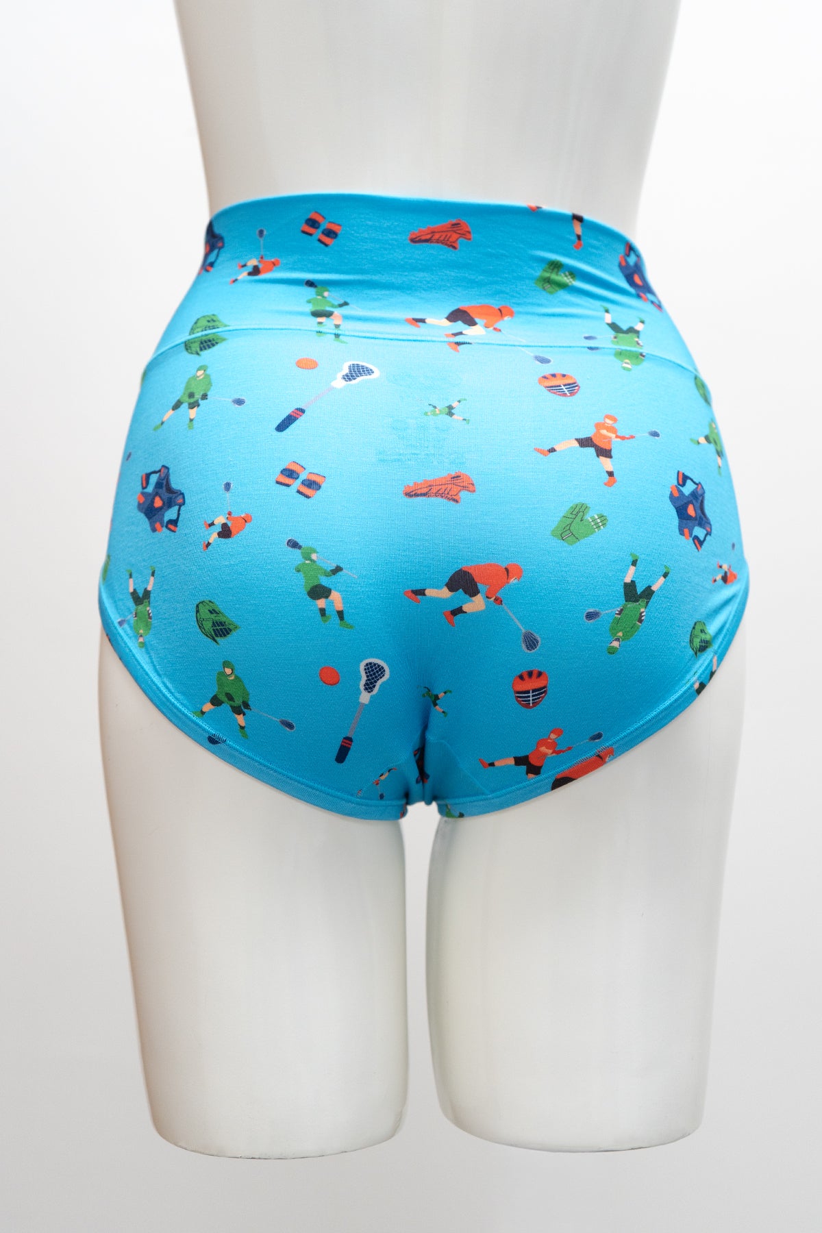 Blue underwear with a colorful lacross pattern on a mannequin against a white background, back view
