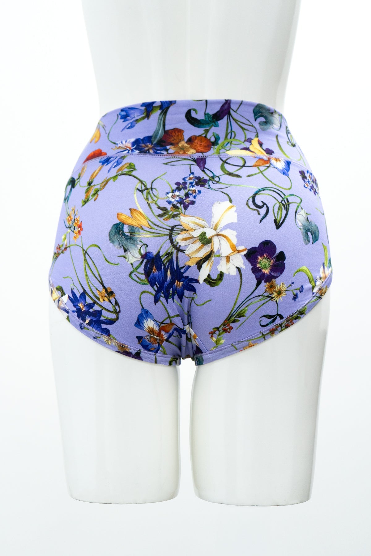 Back view of purple floral print woman's underwear featuring high rise detail and full-coverage bottom