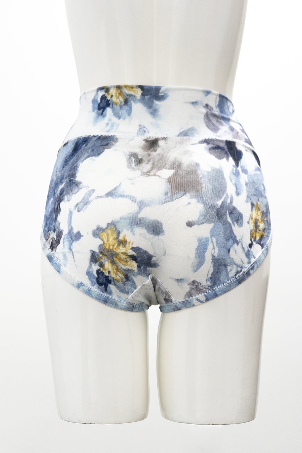 Back view of high-rise full-coverage blue and white floral print woman's underwear