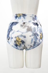 Back view of high-rise full-coverage blue and white floral print woman's underwear