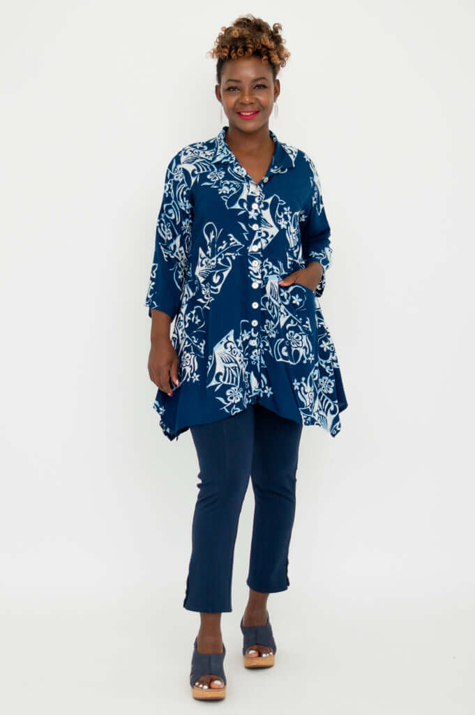Model with hand in pocket wearing Laney Blouse and matching blue pants