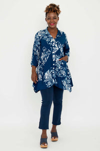 Model with hand in pocket wearing Laney Blouse and matching blue pants