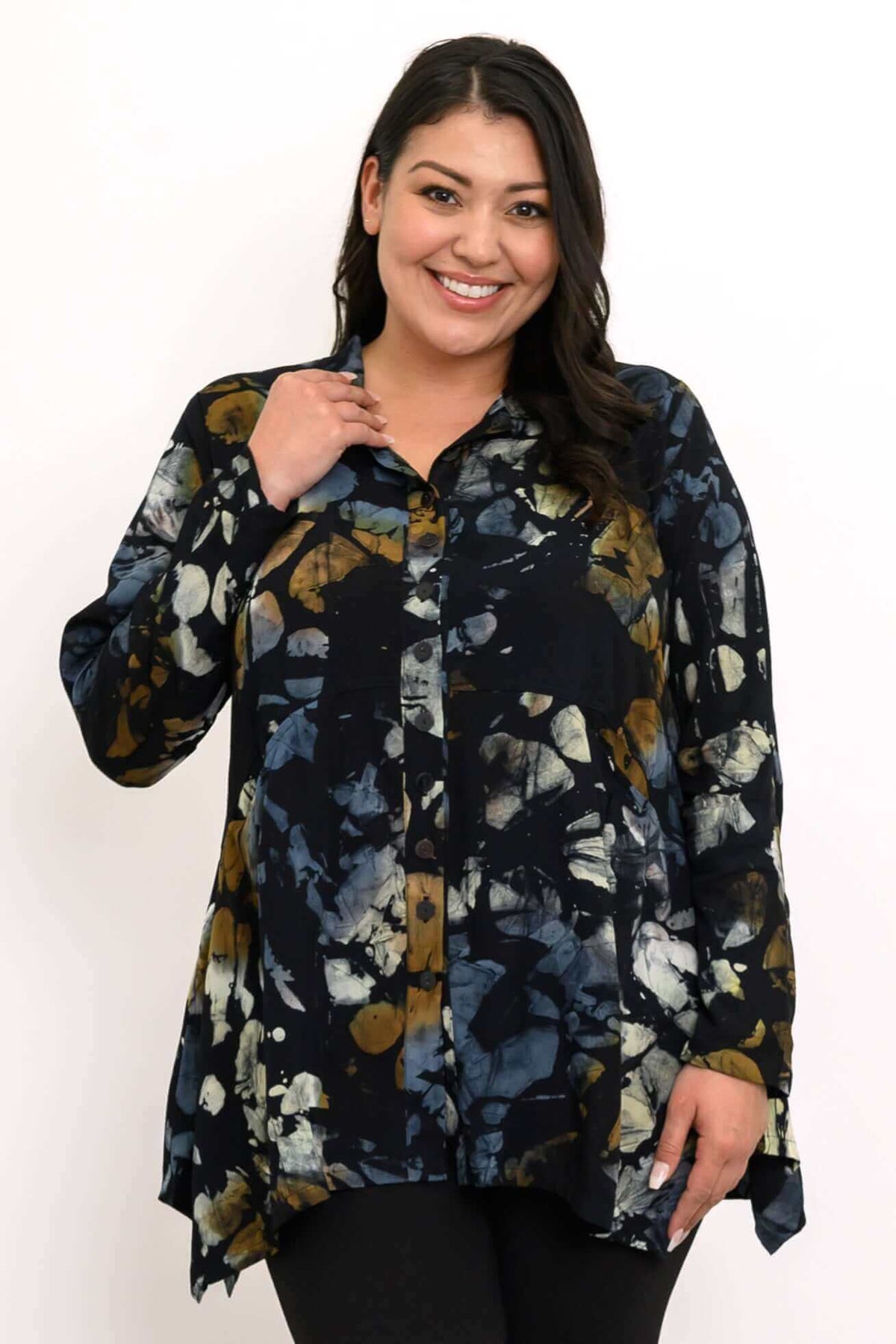 Woman wearing the Laney Blouse in Night Bloom, close-up front view