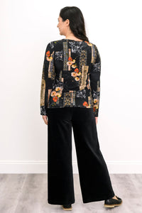 Fitted women's long sleeve floral top with a straight hemline, shown from a rear angle.