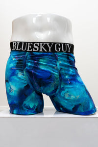 Blue tie-dye boxer briefs with 'Bluesky Guy' waistband on a mannequin against a white background, front view
