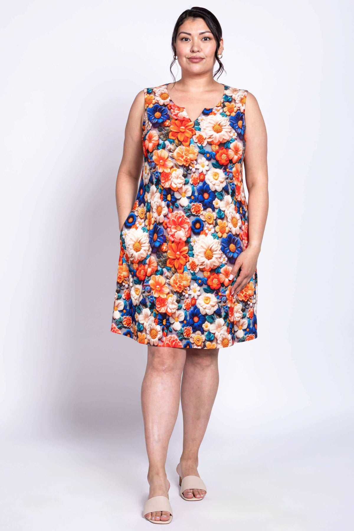 Woman wearing Maggie Shift Dress with hands in pockets, front view