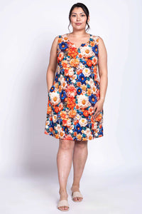 Woman wearing Maggie Shift Dress with hands in pockets, front view
