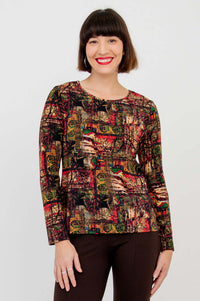 Model smiling in Mariah printed tee showing front and sleeve details