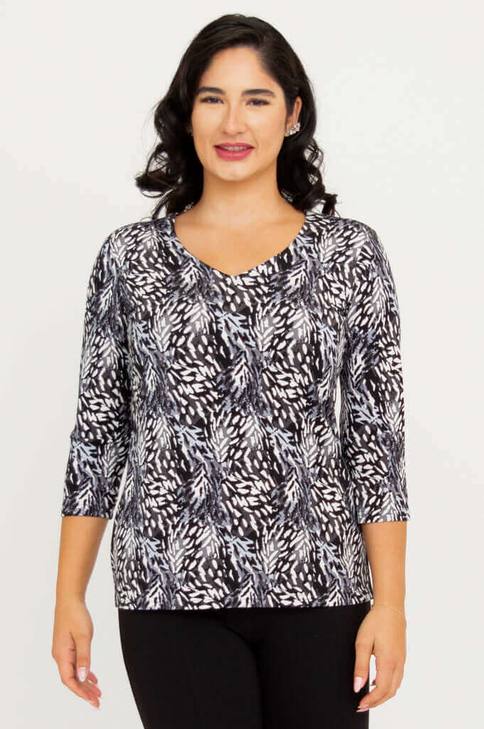 Front view of model wearing Mia Top in Black Feather with 3/4 sleeves