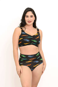 Model wearing Clipper Top and matching high-waisted bottoms in Retro Cars print