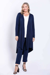 Model in navy slim-fit pants and long navy duster cardigan, front view