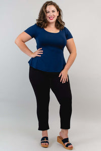 Model in navy Kim Cap Top, hand on hip, straight full front view