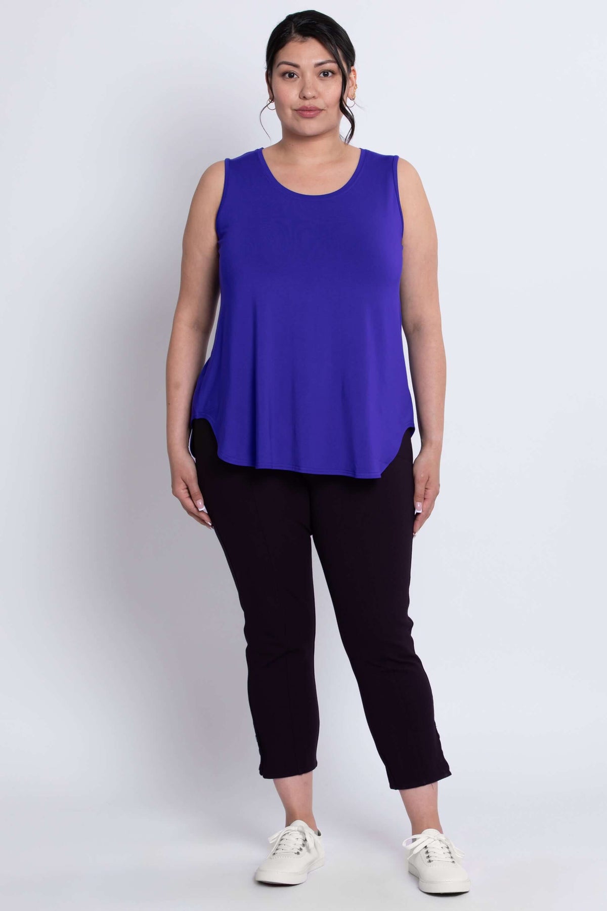Model wearing grape tank top, standing straight with hands by sides