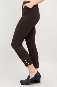 Side view of Nadine Crop Pants in chocolate, highlighting button detail at the ankle and pocket
