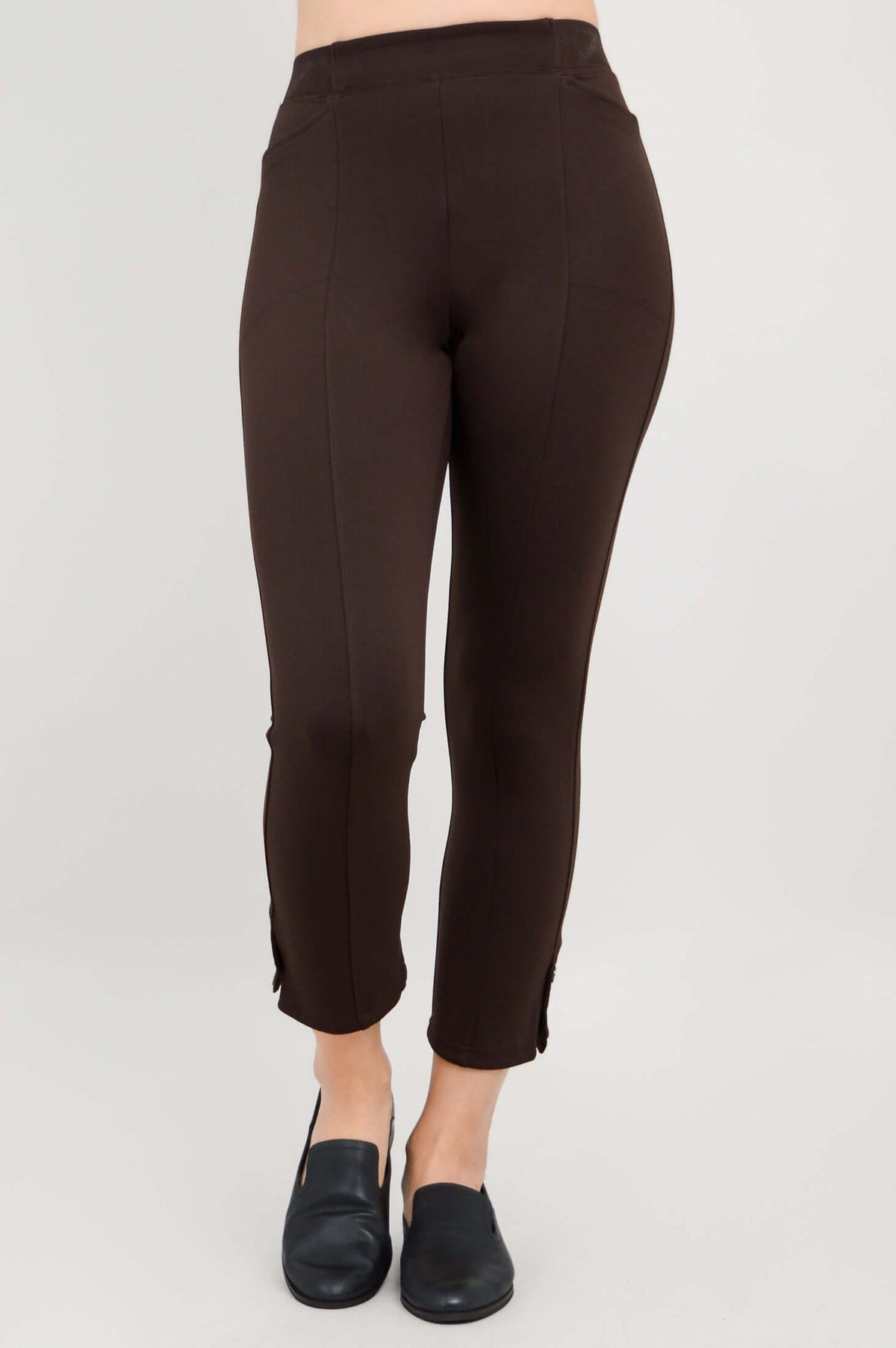 Front view of Nadine Crop Pants in chocolate brown, showing stretch waistband and panel details