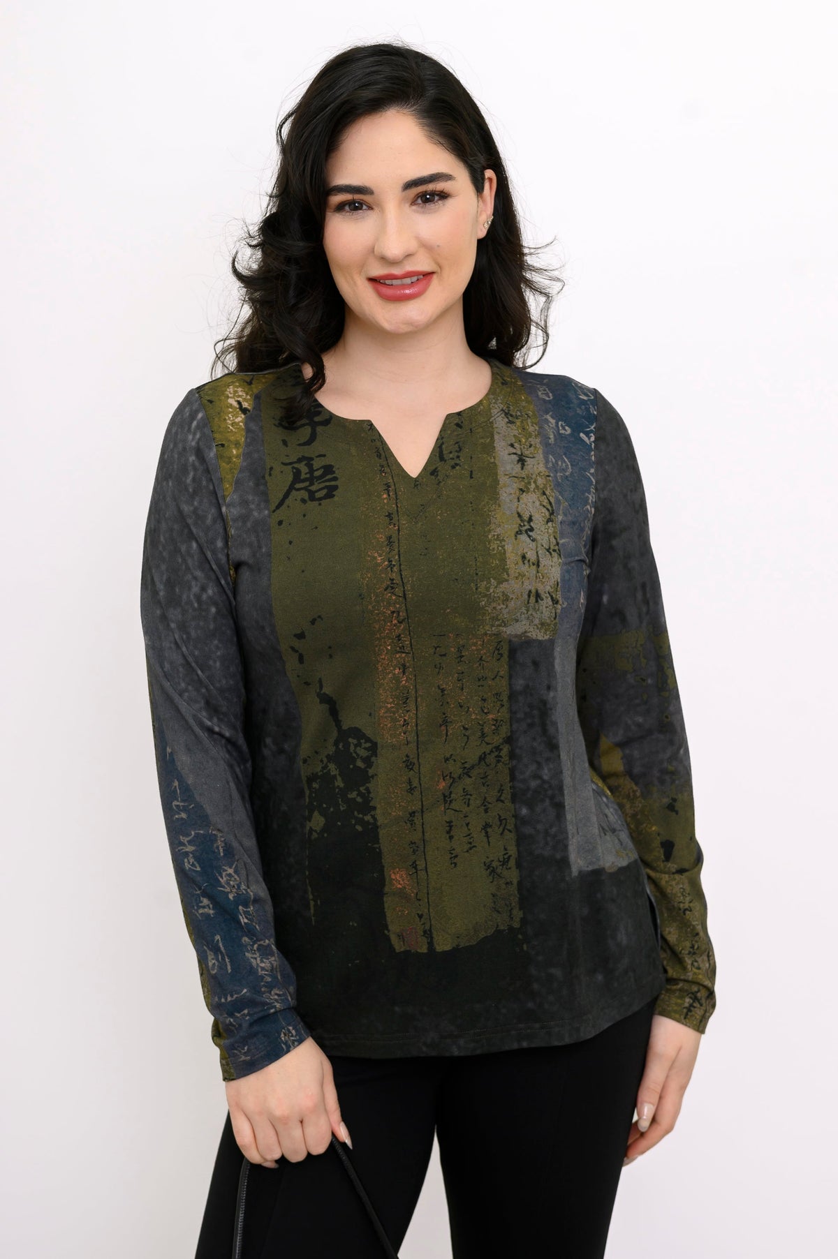 Women's long-sleeve bamboo cotton top featuring a patterned green print, sweetheart neck, and relaxed fit.