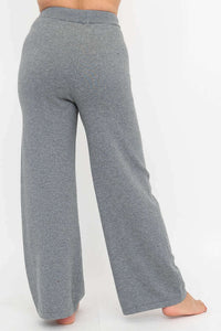 Rear view of grey lounge pants highlighting wide legs and comfortable fit