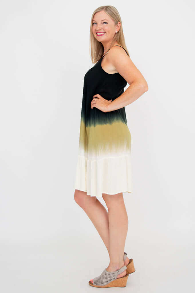 Profile view of woman modeling ombre tiered dress with scoop neckline