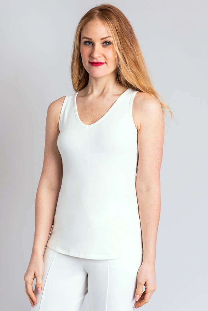 Woman modeling the Reanna Bamboo Tank with V-neck, at an angle