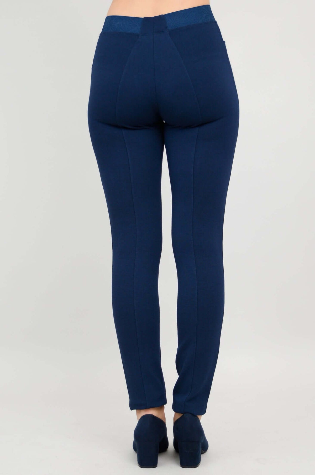 Rear view of navy Nadia Pants showing seam and structured design
